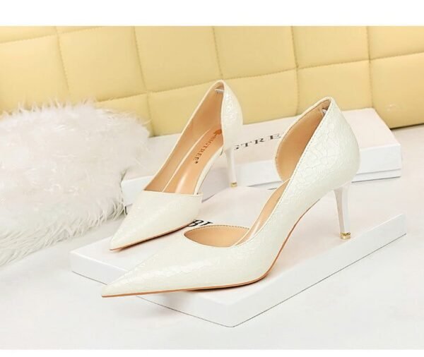 2928-2 retro European and American slim pedicure side hollow thin heel high heel shallow pointed stone pattern women's shoes