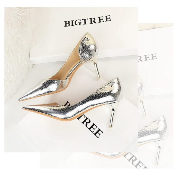 2928-1 European and American style fine-heeled high-heeled shallow pointed side hollow retro metal stone pattern shoes