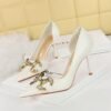 21fccf1ff2f58b4f2fb7fc133c8a0e90 big tree shoes 8238-1 European and American Banquet High Heels Stiletto Heel Shallow Mouth Pointed Toe Side Hollow Metal Rhinestone Buckle Pumps Women's Shoes