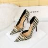 434894f07d3298ac758cd510cdca783c 8829-1 Korean version of high-heeled shoes with lattice pattern shallow mouth side hollow houndstooth pearl metal chain super high-heeled shoes