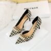 8829-A1 Korean version of high-heeled shallow-mouth pointed side hollow cloth plaid pearl metal chain houndstooth shoes