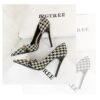 94493038245cdd39f34c6347318c4fee 8829-1 Korean version of high-heeled shoes with lattice pattern shallow mouth side hollow houndstooth pearl metal chain super high-heeled shoes