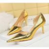2928-1 European and American style fine-heeled high-heeled shallow pointed side hollow retro metal stone pattern shoes