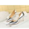 2928-1 European and American style fine-heeled high-heeled shallow pointed side hollow retro metal stone pattern shoes