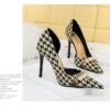 e7707437894887948f176ec991a69d35 8829-1 Korean version of high-heeled shoes with lattice pattern shallow mouth side hollow houndstooth pearl metal chain super high-heeled shoes
