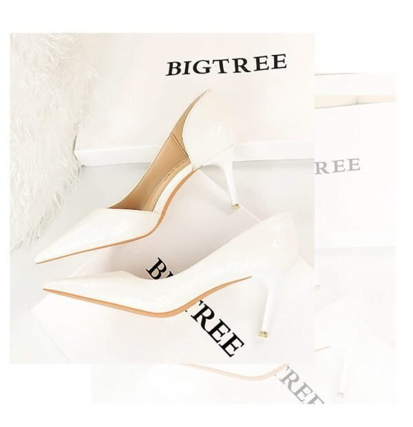 2928-2 retro European and American slim pedicure side hollow thin heel high heel shallow pointed stone pattern women's shoes