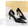 2928-1 European and American style fine-heeled high-heeled shallow pointed side hollow retro metal stone pattern shoes