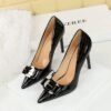 BIGTREE 18249-K91 European and American style super high-heeled women's shoes patent leather metal bow splicing stiletto high heels