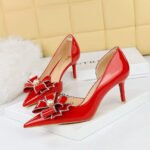 BIGTREE 638-AH13 European and American Banquet High Heel Shiny Patent Leather Shallow Mouth Pointed Side Hollow Pearl Rhinestone Bow Pumps - Image 2