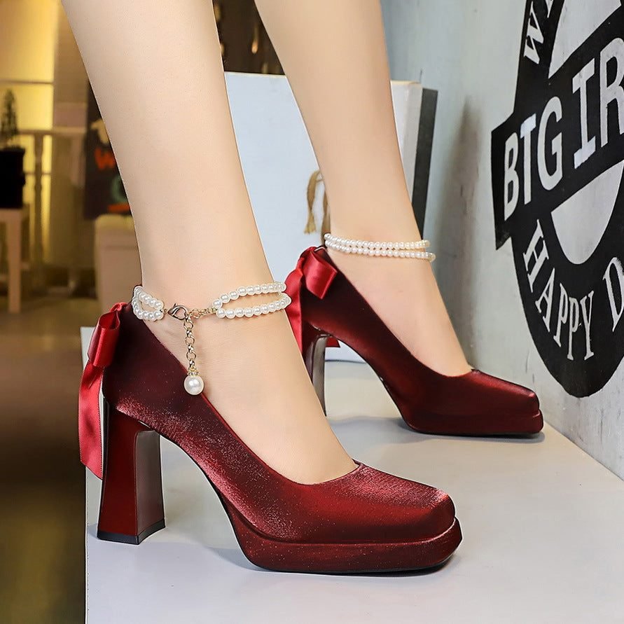 Product image BIGTREE 9982-H79TP Korean version of square head thick heel waterproof table high heels pearl word with back bow satin shoes - Image 1
